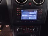 a radio in the center of a car with buttons on it