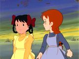 cellule d'animation représentant une jeune fille et une autre jeune fille en robe jaune