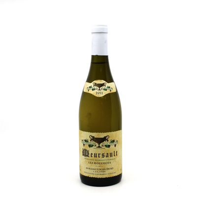 a bottle of wine that is sitting on a table