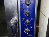 an image of a close up of a blue and silver oven