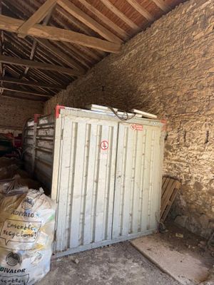 a white container sitting in the middle of a room