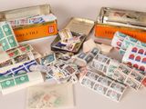 many different types of stamps and stamps in a box