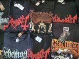 many t - shirts that are on display in a store