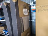 a cardboard box that is sitting on a shelf in a store