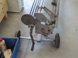 a machine that is sitting on the floor next to a container