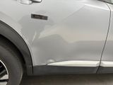 a close up of a car door with a sticker on it