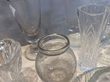 a table with a lot of glassware on it