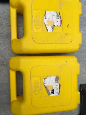 two yellow containers that are sitting on a table