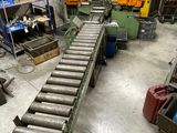 a conveyor belt in the middle of a factory