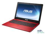 the asus laptop is red and has a black keyboard