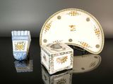 a small white box and a small blue and white box