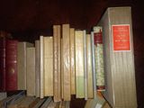 many books that are on a shelf together