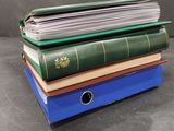 three books stacked on top of each other on a table