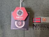 a badge on the back of a jacket with a name tag attached to it