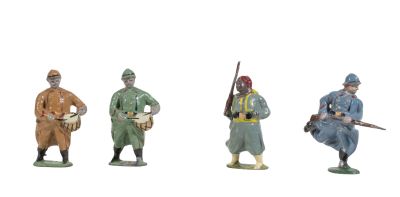 four figurines of men dressed in military uniforms