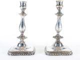pair of antique silver candlesticks