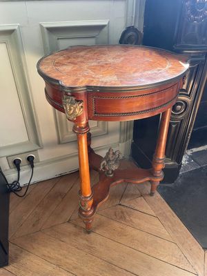a small table with a cat sitting on top of it