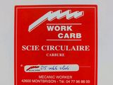 a sign that says work car on the side of a building