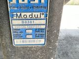 a parking meter that has a blue and white sticker on it