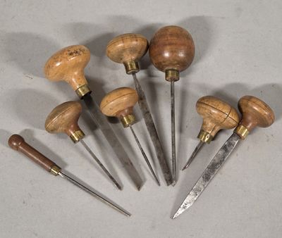 several different types of woodworking tools are arranged on a table
