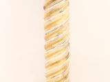 gold twisted glass candle holder on a white background