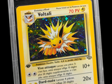 a close up of a pokemon card in a plastic case