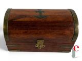 a small wooden box with an anchor on it