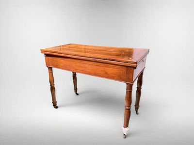 an old wooden table with a drawer on top of it