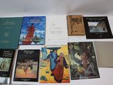 a lot of books that are on a table