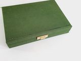 an image of a green box on a white surface