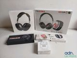 two boxes of headphones sitting on top of a table next to each other