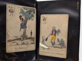 une photo d'un livre ouvert, sur laquelle on voit l'image d'un homme et d'une femme