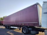 a large semi truck that is parked in a parking lot