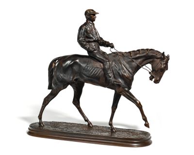 statue of a man riding a horse on a wooden base