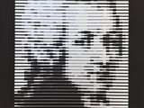 a black and white photo of a man ' s face with lines coming out of it