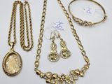 a collection of jewellery including a necklace, bracelet and ring
