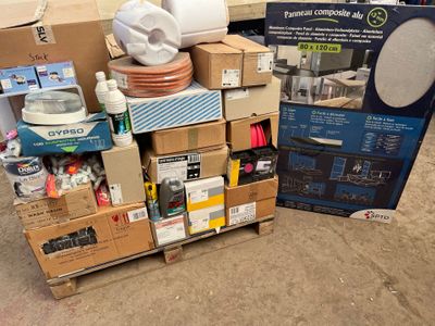 a pile of boxes and a box of toilet paper