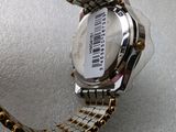 a close up of a watch with a barcode on it