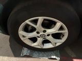 a close up of a tire on the ground