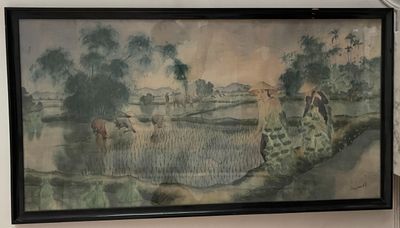 une image d'un tableau sur le mur d'une pièce