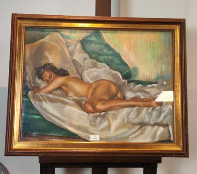 une peinture représentant une femme nue allongée sur un lit