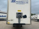 the back of a white box truck parked in a parking lot