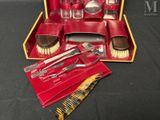 a red case with tools in it sitting on a table