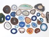 a lot of different types of agate on the table