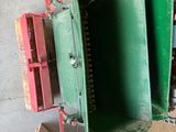 a green box that has a bunch of tools inside of it