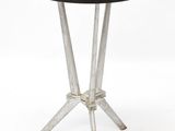 an image of a table with a black top and metal legs