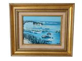 painting of boats on the water in a gold frame