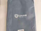 a blue cloth with a logo on it sitting on a table