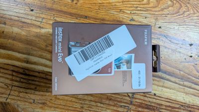 a box with a barcode on it sitting on a wooden table