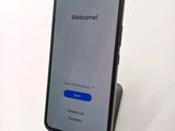 an image of a cell phone with a welcome screen on it